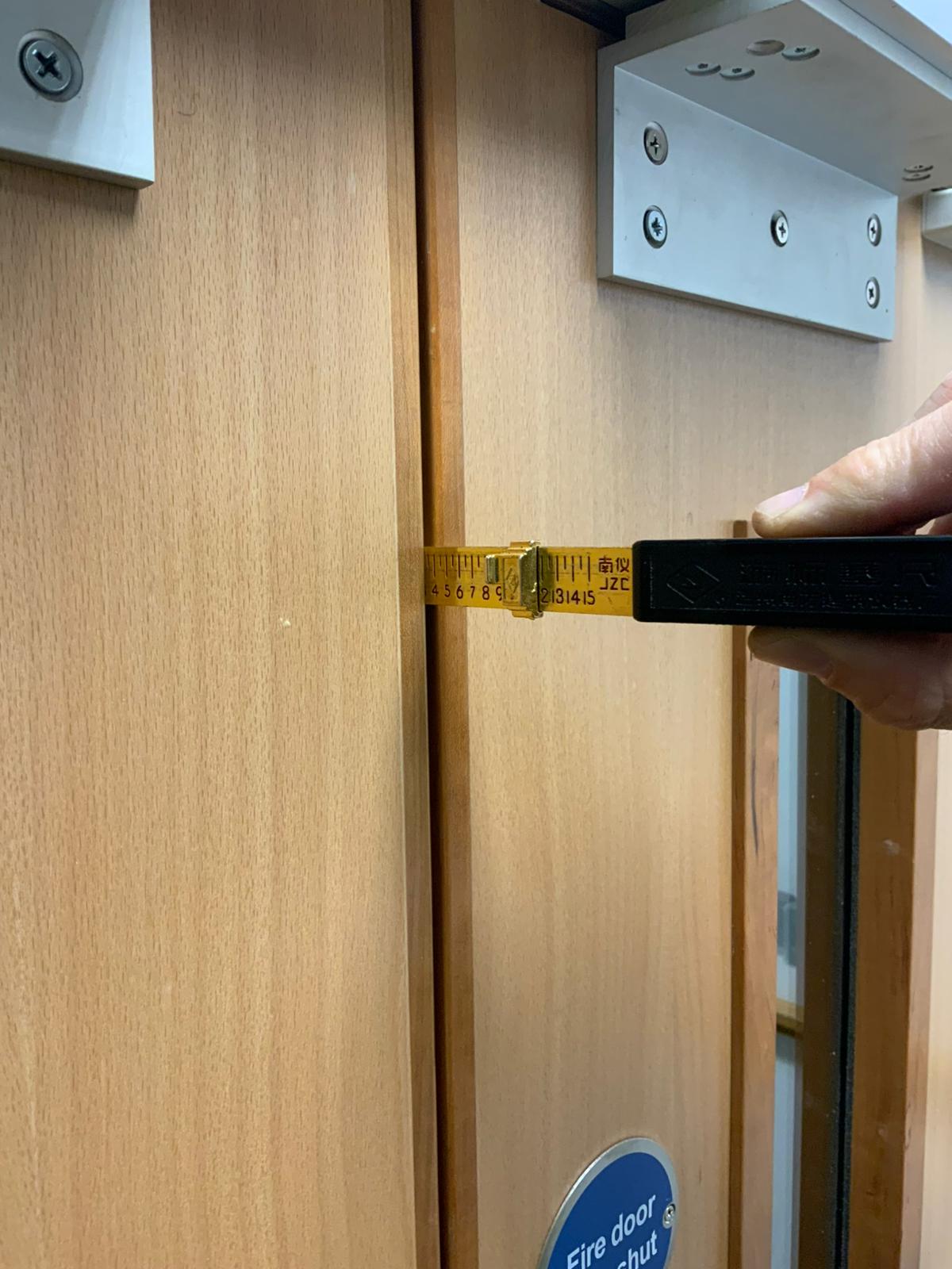 Fire door inspection - checking gaps and seals